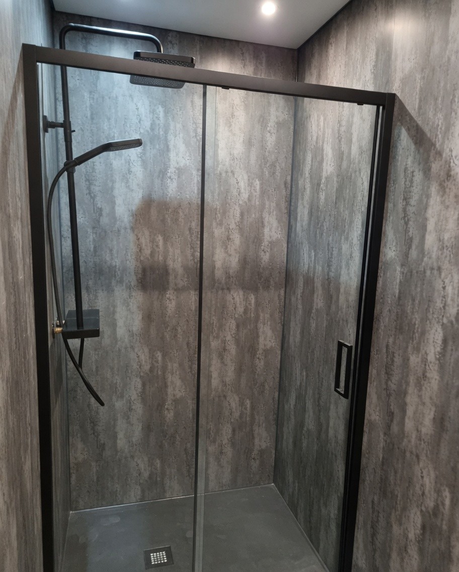Finished black-framed glass shower enclosure